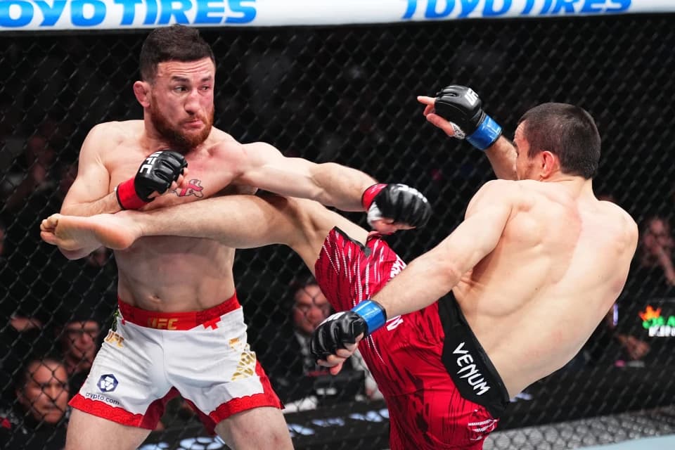 Мераб Двалишвили Нурмагомедовты жеңіп, UFC чемпиондық белбеуін қорғады